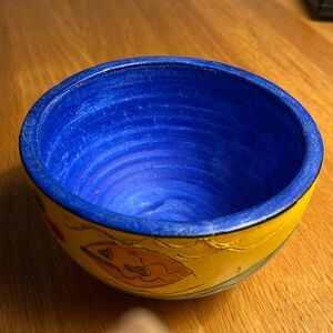 Colorful, unique hand-crafted pottery bowl.  Signed by artist.